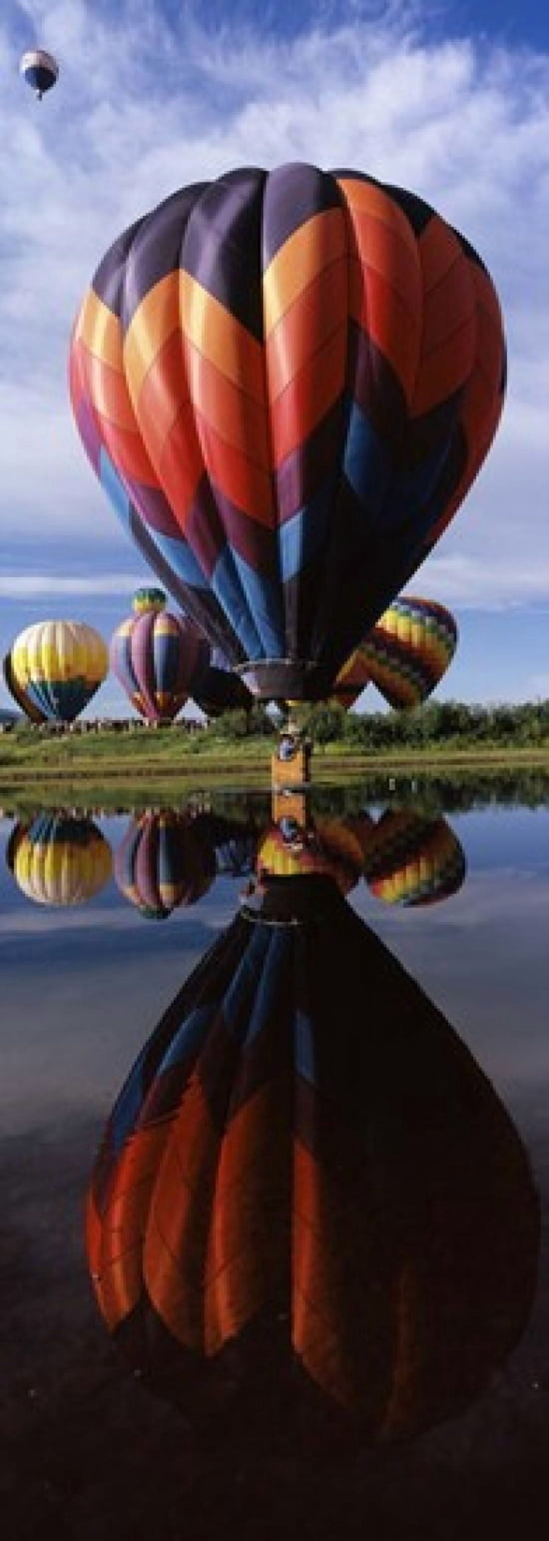 Reflection of hot air balloons in a lake Hot Air Balloon Rodeo Steamboat Springs Routt County Colorado USA Canvas Art - Panoramic Images (36 x 13)