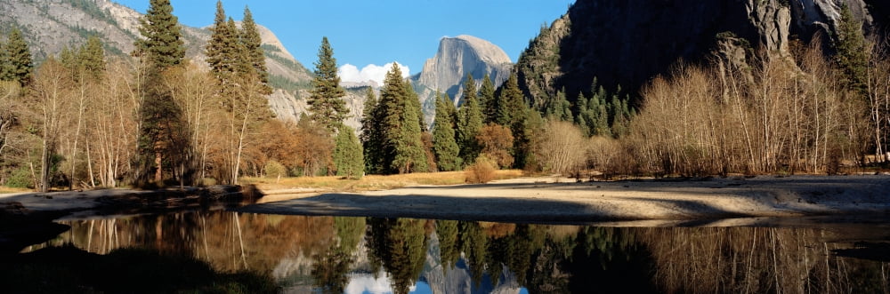 Reflection of mountains and trees in a lake Half dome Yosemite National Park California USA Canvas Art - Panoramic Images (36 x 12)