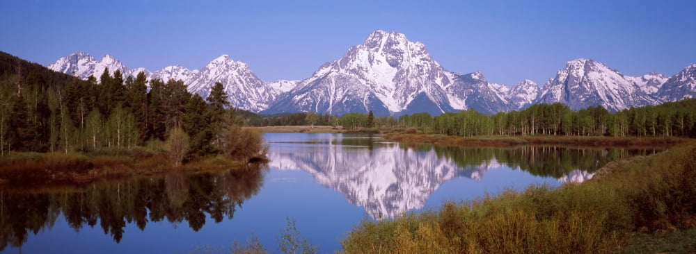 Reflection of mountains and trees in a river Oxbow Bend Snake River Grand Teton National Park Wyoming USA Canvas Art - Panoramic Images (36 x 12)