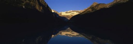 Reflection of mountains in a lake Lake Louise Banff National Park Alberta Canada Canvas Art - Panoramic Images (36 x 12)
