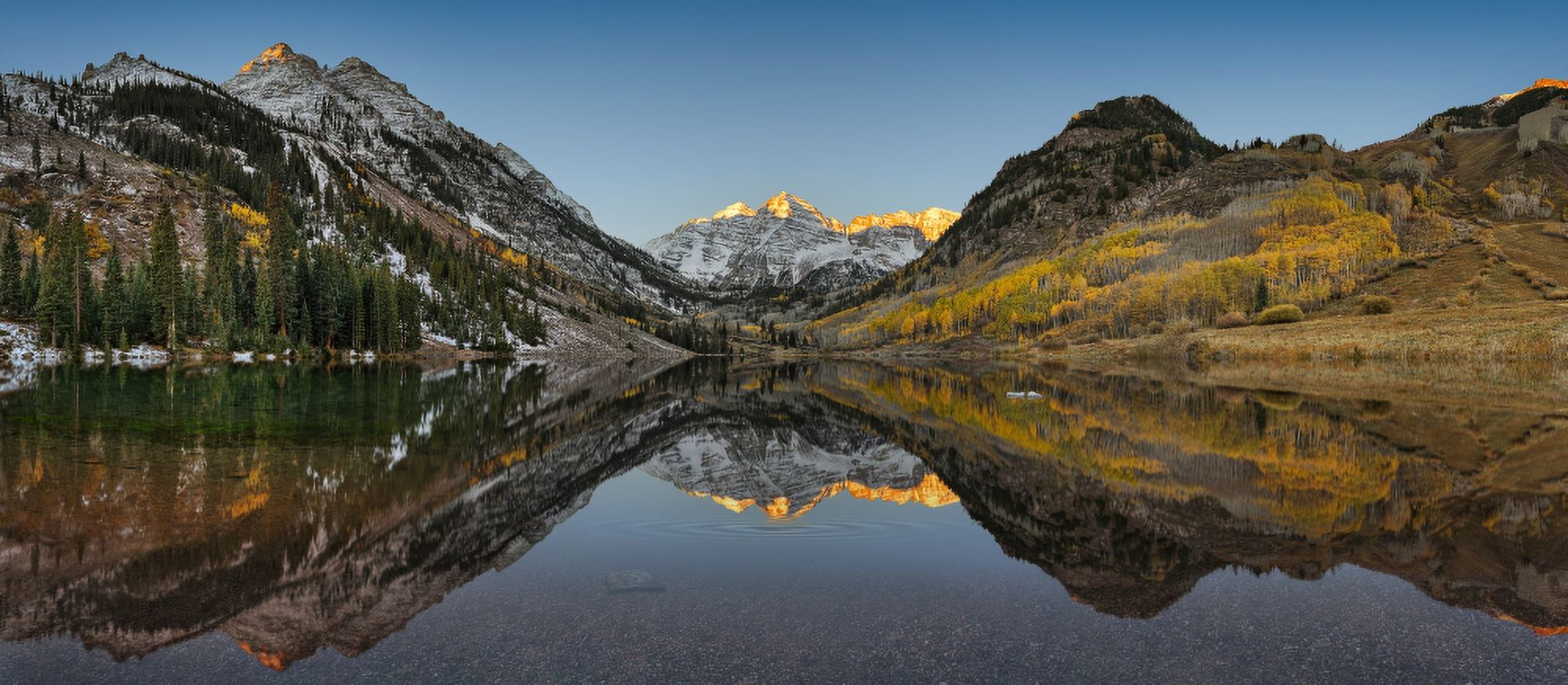 Reflection of mountains in a lake Maroon Bells Aspen Pitkin County Colorado USA Canvas Art - Panoramic Images (27 x 9)