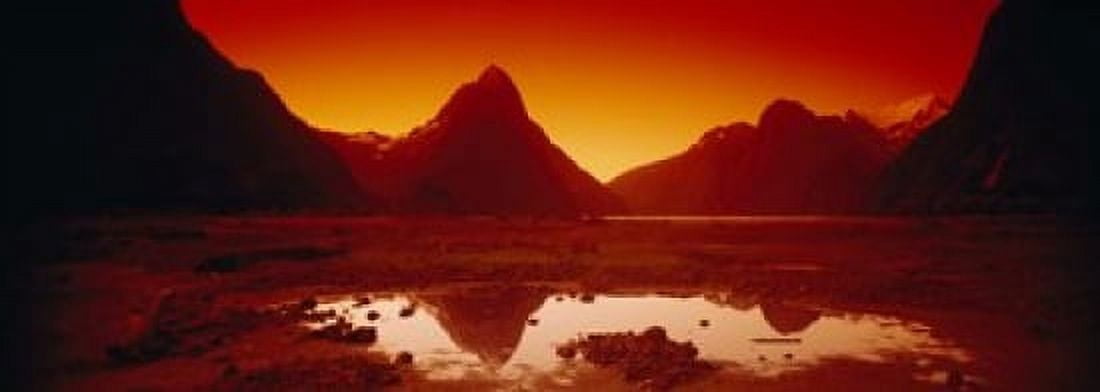 Reflection of mountains in a lake Mitre Peak Milford Sound Fiordland National Park South Island New Zealand Canvas Art - Panoramic Images (18 x 7)
