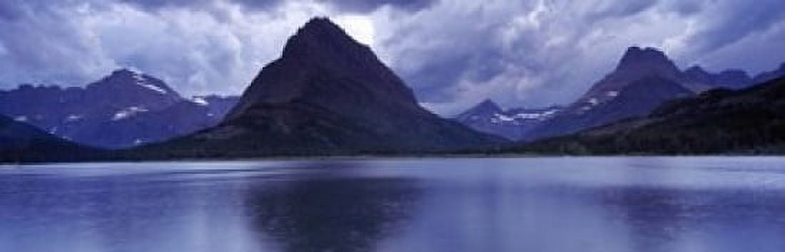 Reflection of mountains in a lake Swiftcurrent Lake Many Glacier US Glacier National Park Montana USA Canvas Art - Panoramic Images (18 x 6)