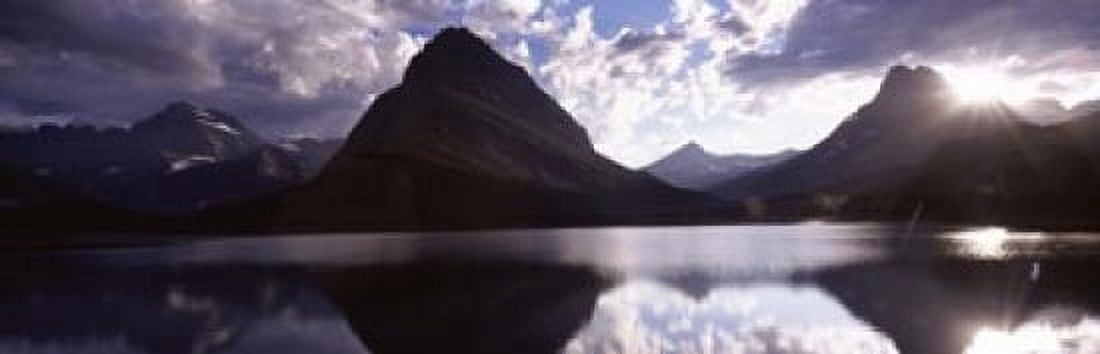 Reflection of mountains in a lake Swiftcurrent Lake Many Glacier US Glacier National Park Montana USA Canvas Art - Panoramic Images (18 x 6)