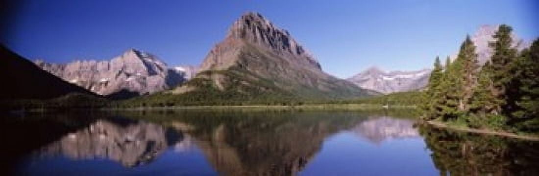 Reflection of mountains in a lake Swiftcurrent Lake Many Glacier US Glacier National Park Montana USA Canvas Art - Panoramic Images (18 x 6)
