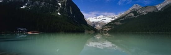 Reflection of mountains in water Lake Louise Banff National Park Alberta Canada Canvas Art - Panoramic Images (36 x 12)