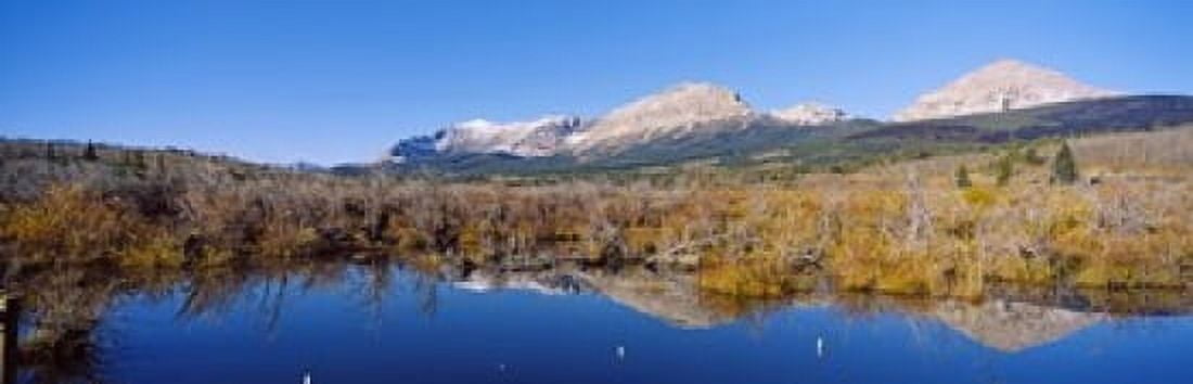 Reflection of mountains in water Milk River US Glacier National Park Montana USA Canvas Art - Panoramic Images (18 x 6)