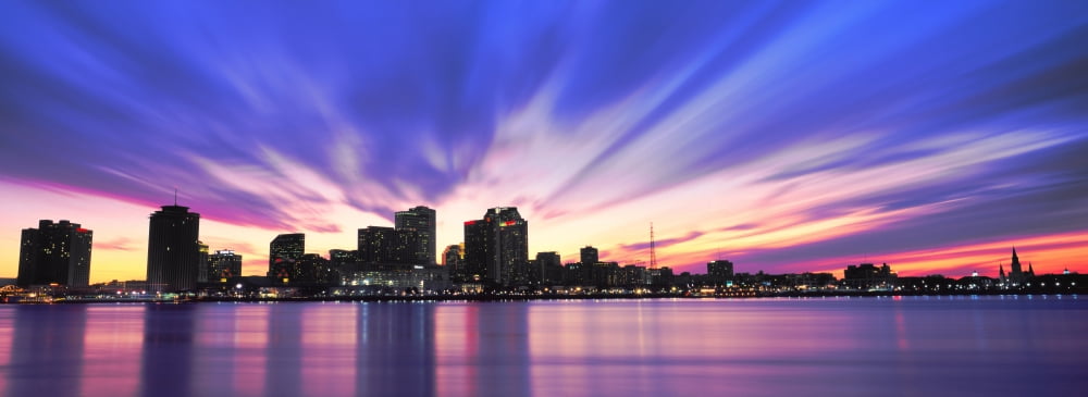 Reflection of skyscrapers on water River Mississippi New Orleans Louisiana USA Canvas Art - Panoramic Images (36 x 12)
