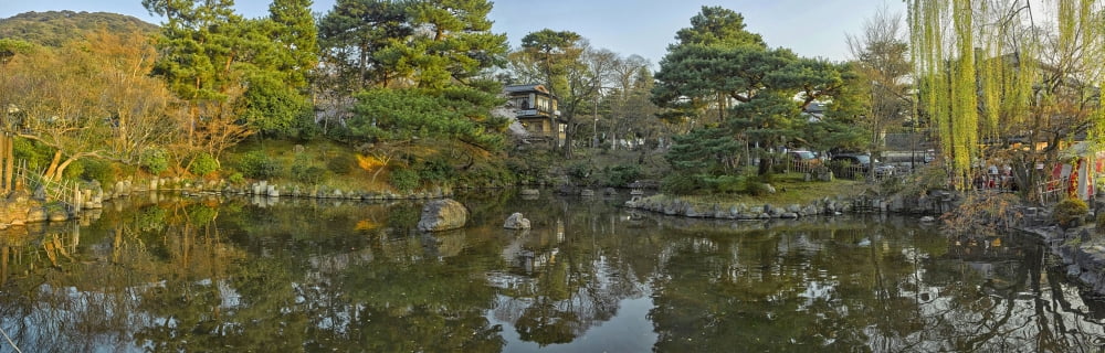 Reflection of trees in a pond Maruyama Park Kyoto Kyoto Prefecture Japan Canvas Art - Panoramic Images (36 x 12)