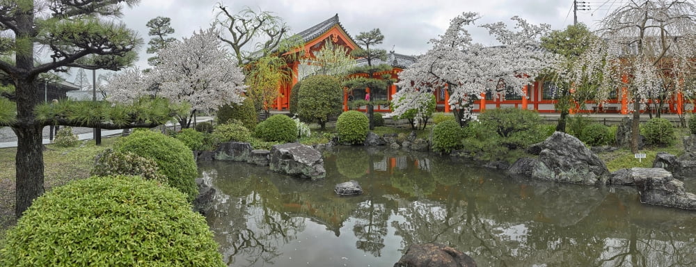 Reflection of trees in pond at Sanjusangen-do temple Higashiyama District Kyoto Kyoto Prefecture Japan Canvas Art - Panoramic Images (36 x 12)