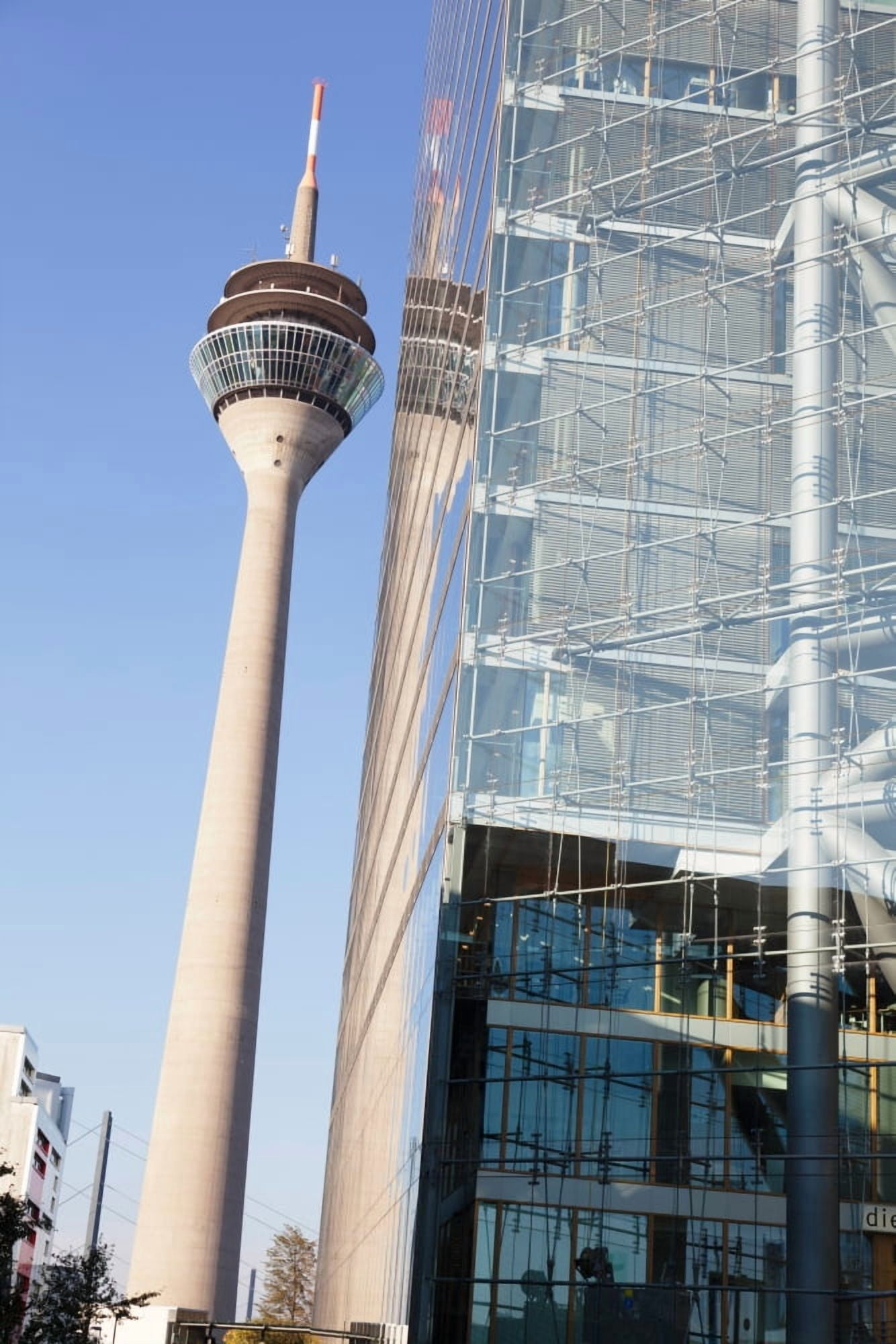 Reflection of a tower on a office building Rheinturm Tower Stadttor City Gate Dusseldorf North Rhine Westphalia Germany Canvas Art - Panoramic Images (36 x 12)