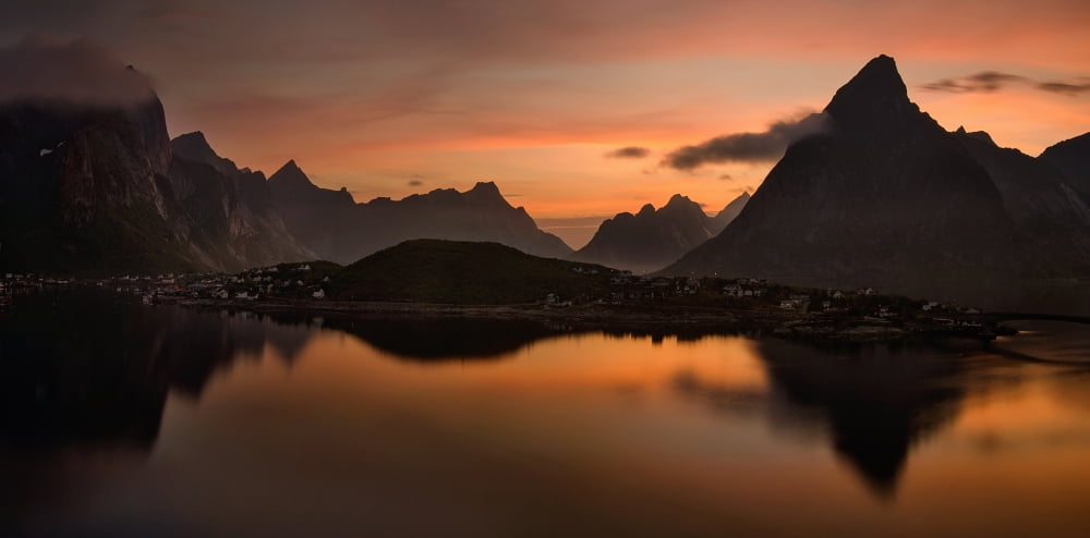 Reine village with dark mountains at sunset Lofoten Nordland Norway Canvas Art - Panoramic Images (12 x 24)