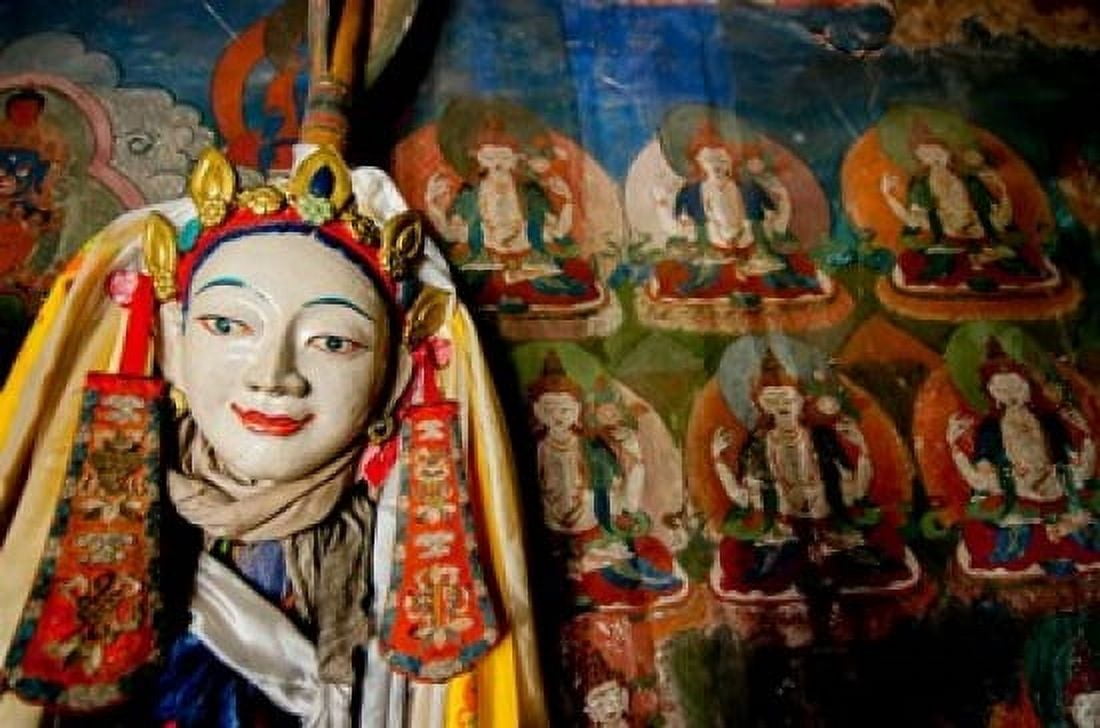 Religious statue infront of Buddha mural at Shey Palace Ladakh India Canvas Art - Ellen Clark DanitaDelimont (19 x 29)
