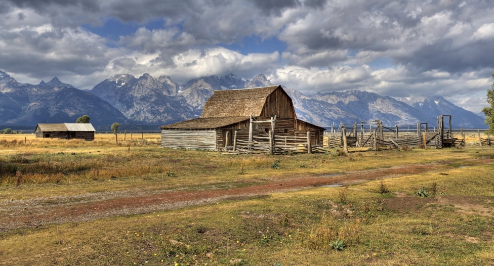 Remote Landscape With Mountains In Background Mormon Row Historic District Grand Teton National Park Teton Range Wyoming Usa Canvas Art - Robert Bartow Design Pics (26 x 14)