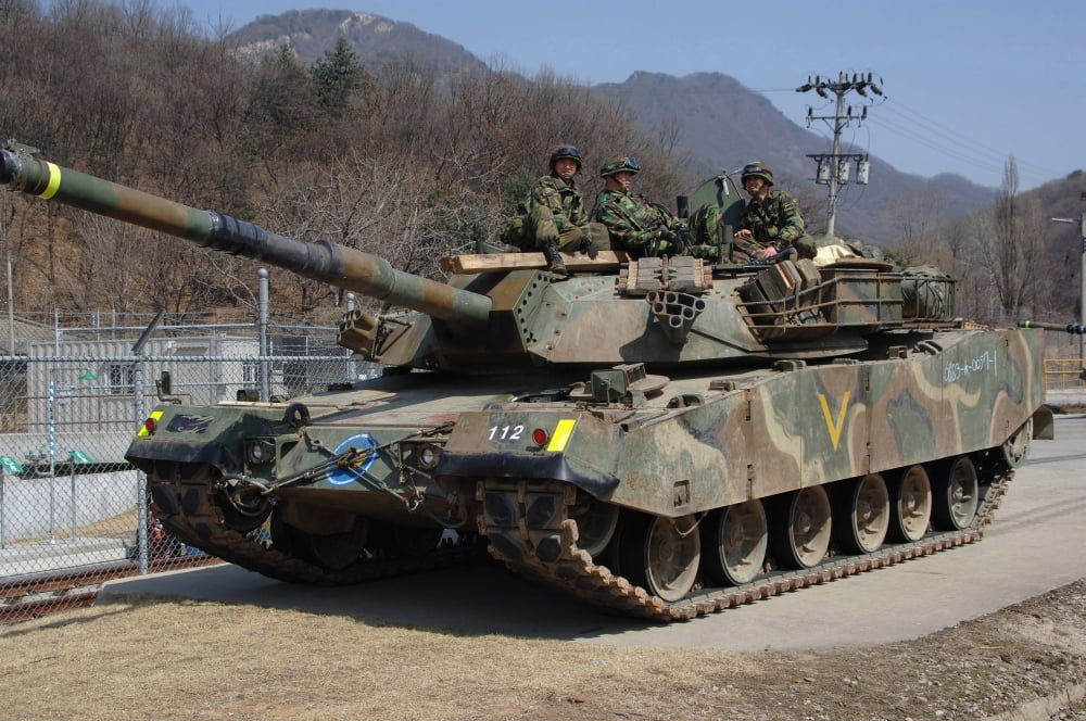 Republic of Korea Army Soldiers sit on top of a K1 Main Battle Tank Canvas Art - Stocktrek Images (34 x 23)