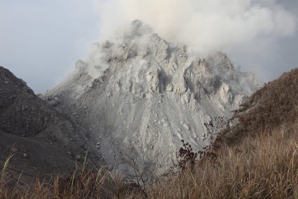 Rerombola lava dome of Paluweh volcano Indonesia Canvas Art - Richard RoscoeStocktrek Images (18 x 12)