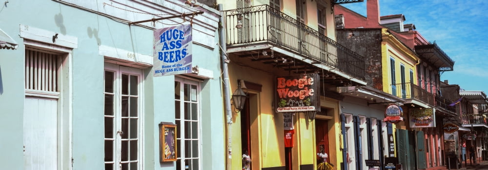 Restaurants along Bourbon Street French Quarter New Orleans Louisiana USA Canvas Art - Panoramic Images (27 x 9)