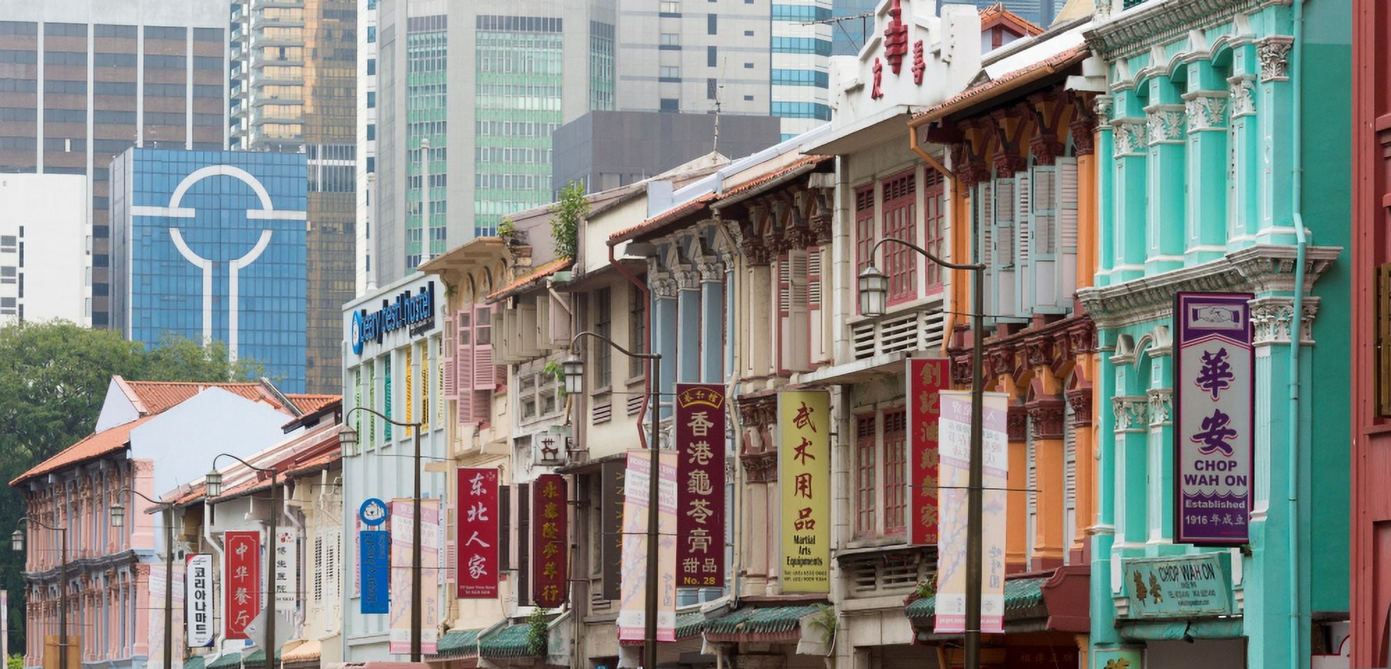 buildings against the modern buildings Chinatown Singapore Canvas Art - Panoramic Images (19 x 9)