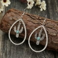 thumbnail image 1 of Retro Hollow Silver Textured Saguaro Cactus Oval Turquoise Stone Drop Earrings, 1 of 5