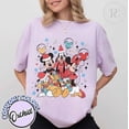 thumbnail image 1 of Retro Mickey And Friends Christmas Shirt, Comfort Color Mickey Minnie Christmas On Main Street, Family Christmas Matching Tee,Orchid Color,Size L, 1 of 5