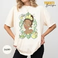 thumbnail image 1 of Retro Princess Tiana T-Shirts, The Princess and the Frog Tee, Disney Princess Tiana Graphic shirt, Comfort Colors Ivory Magic Kingdom Tee,Ivory Color,Size L, 1 of 2