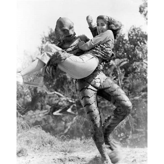 Revenge of the Creature The Gill Man runs off with Lori Nelson 8x10 inch photo