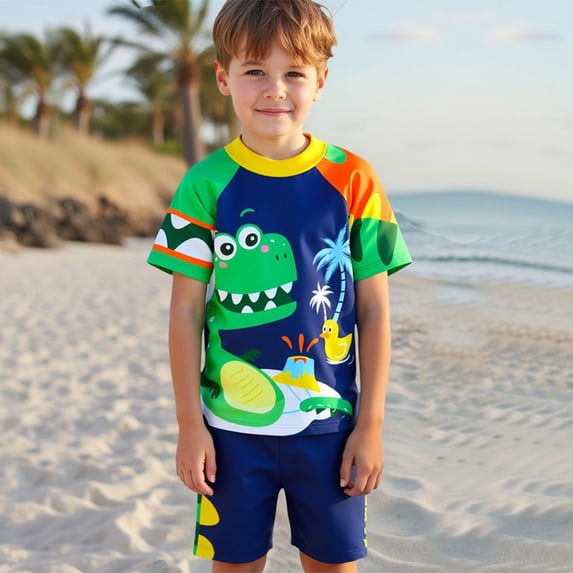 Rggeeun Boys Child Swimsuit Set 2Pc Cute Dinosaur & Coconut Tree Pattern Short Sleeve Crew Neck Top & Elastic Waist Wide Leg Swim Trunks for Summer Beach Surf Classic Swim Wear,Blue,7-8 Years
