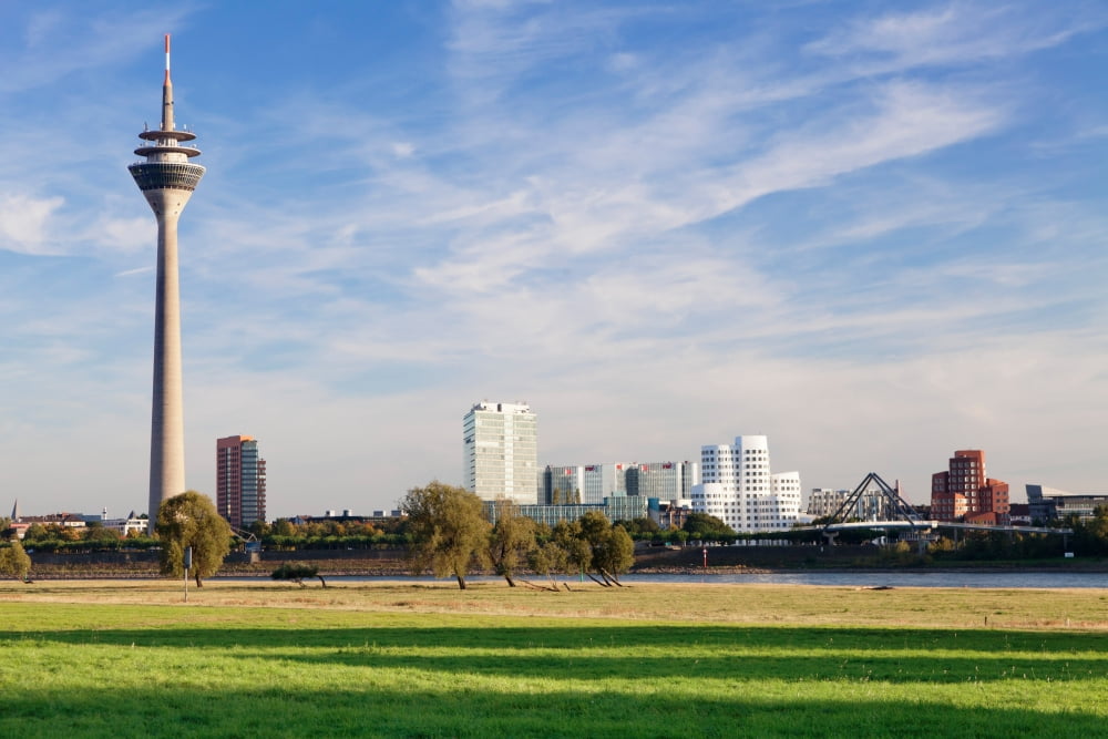 Rheinturm Tower and Neuer Zollhof building at Media Harbour Dusseldorf North Rhine Westphalia Germany Canvas Art - Panoramic Images (36 x 12)