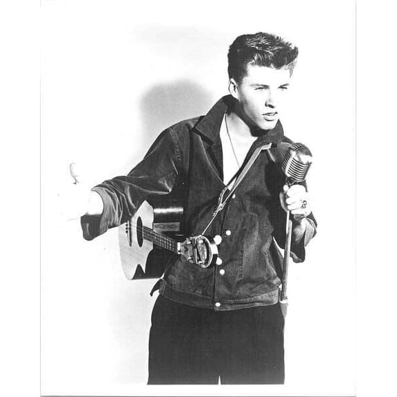 Rick Nelson with his guitar holding microphone 8x10 inch photo
