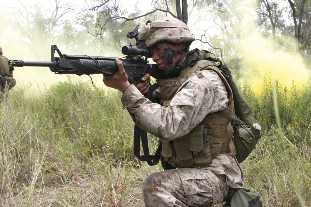 Rifleman fires his M16A-4 Service Rifle Canvas Art - Stocktrek Images (34 x 23)