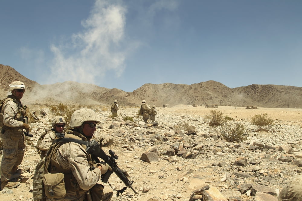 Rifleman gives his team the command to cease fire Canvas Art - Stocktrek Images (35 x 23)