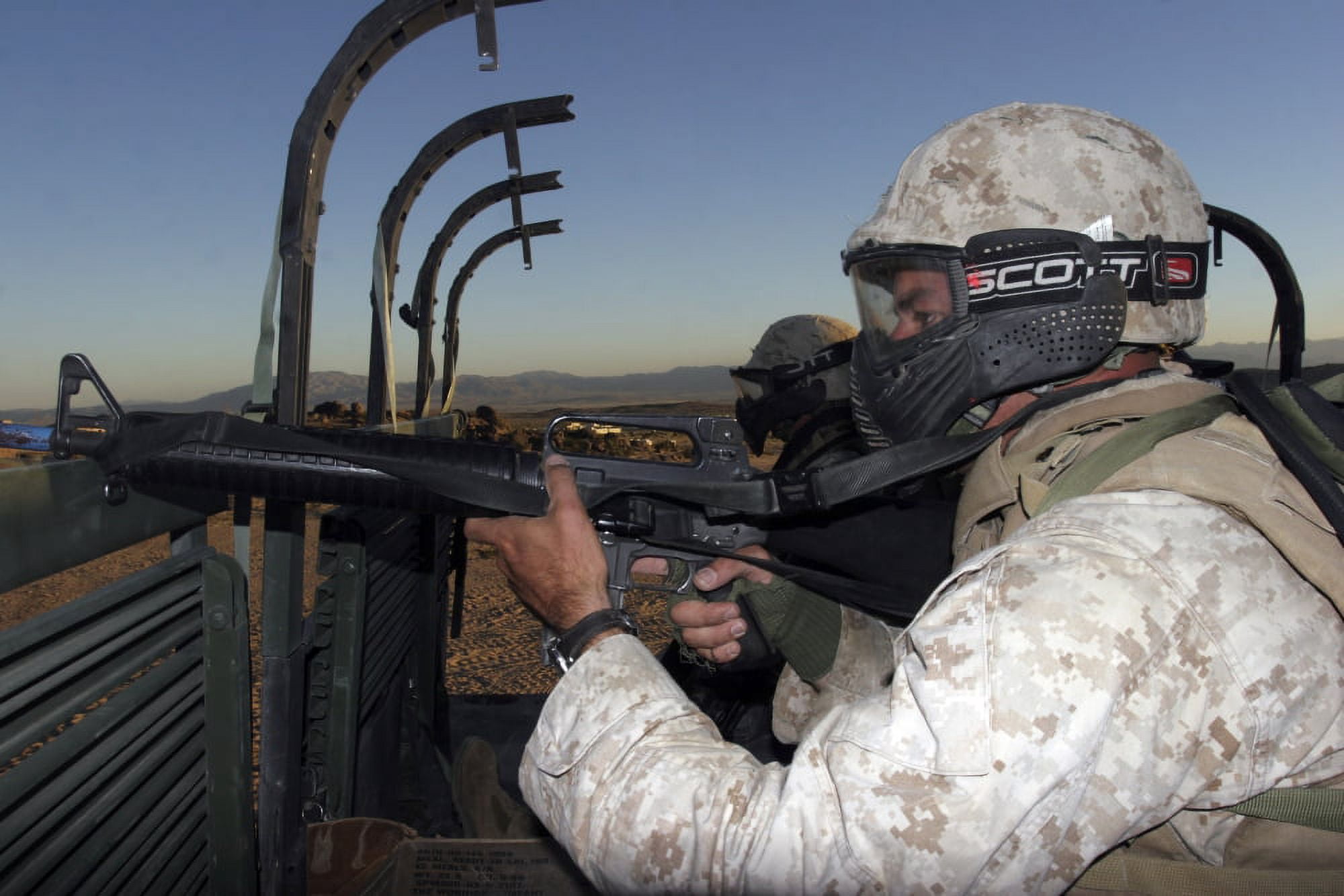 Rifleman keeps alert as he approaches the Military Operations on Urban Terrain facility Canvas Art - Stocktrek Images (34 x 23)