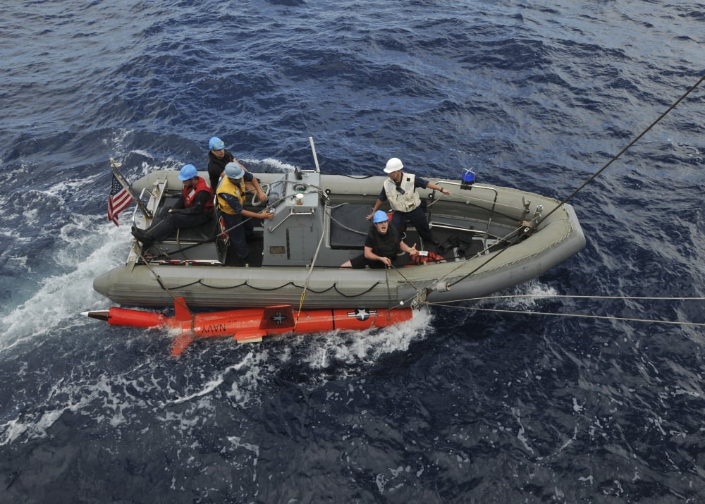 Rigid-hull inflatable boat operators recover a BQM-74E aerial drone Canvas Art - Stocktrek Images (33 x 24)