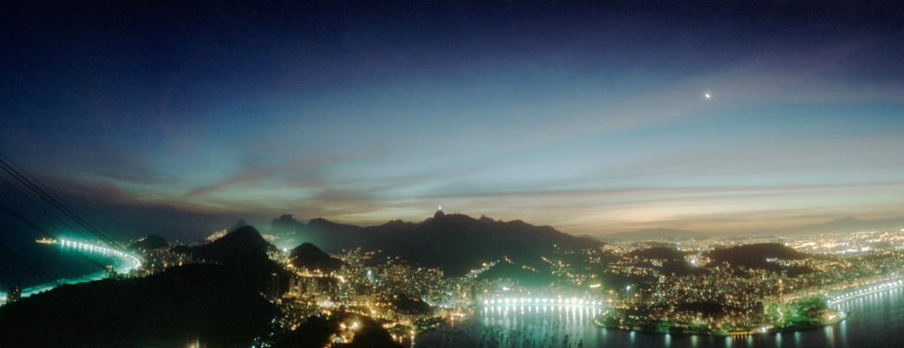 Rio de Janeiro lit up at night viewed from Sugarloaf Mountain Brazil Canvas Art - Panoramic Images (27 x 9)