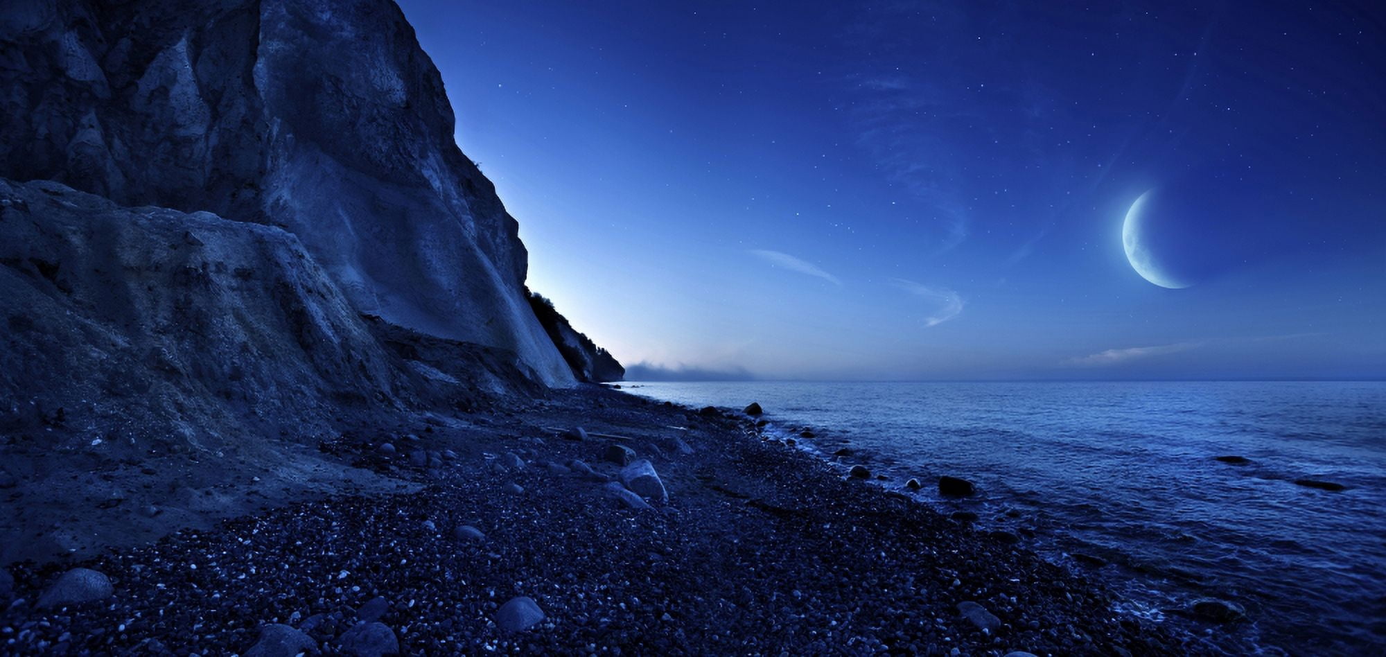 Rising moon over ocean and mountains against starry sky Canvas Art - Evgeny KuklevStocktrek Images (41 x 20)