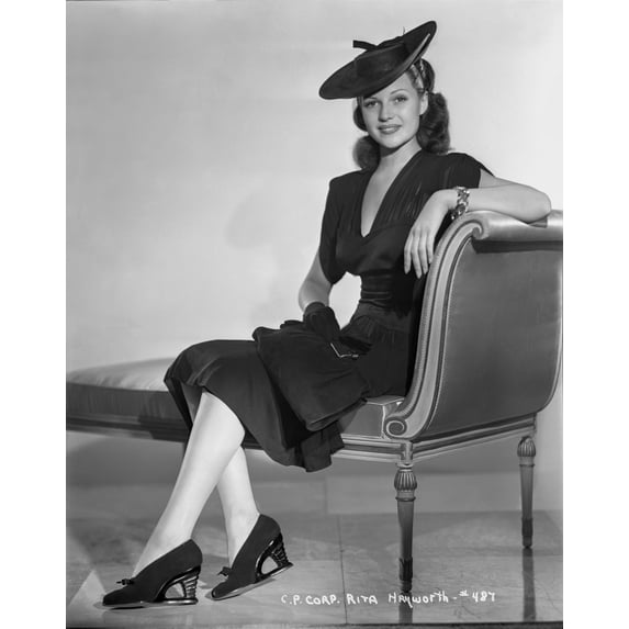 Rita Hayworth Lady in Black sitting and Lying on a Chair Photo Print (8 x 10)