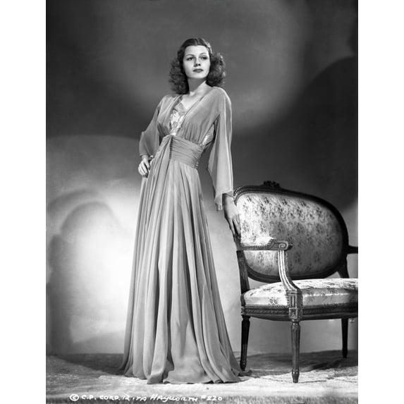 Rita Hayworth Leaning in a Beautiful Gown Photo Print (8 x 10)
