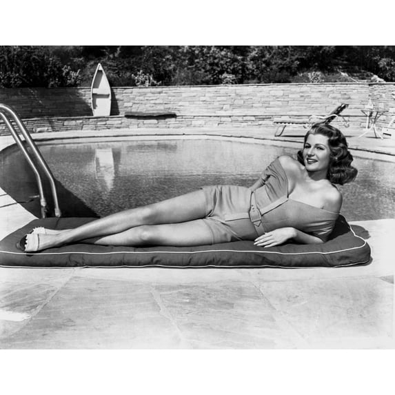 Rita Hayworth Lying on the Side of the Pool Photo Print (24 x 30)