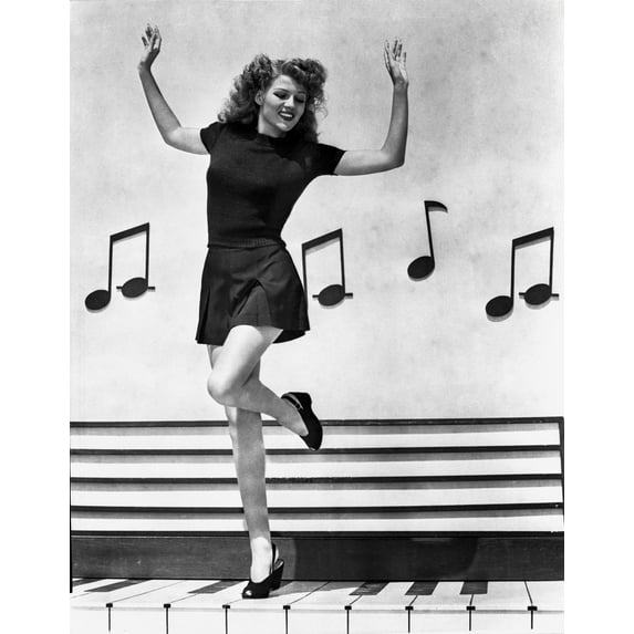 Rita Hayworth Music Notes Background in a Dancing Pose Photo Print (24 x 30)