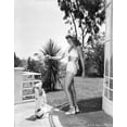 thumbnail image 1 of Rita Hayworth posed in A Swimwear with A Dog Photo Print (8 x 10), 1 of 1