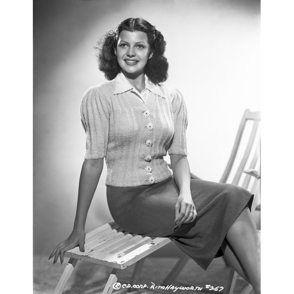 Rita Hayworth posed on the Chair Photo Print (8 x 10)