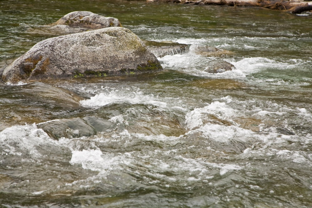 River Water Flowing Downstream Around Rocks Canvas Art - Jeff Schultz Design Pics (34 x 22)