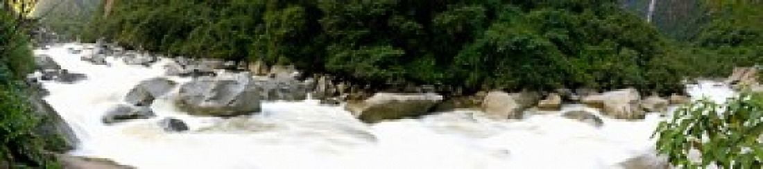 River flowing in a forest Aguas Calientes Urubamba Province Andes Cusco Region Peru Canvas Art - Panoramic Images (22 x 5)