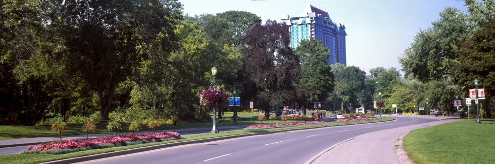 Road leading toward hotel Niagara Falls Ontario Canada Canvas Art - Panoramic Images (36 x 12)