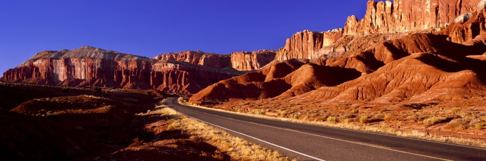 Road passing through Capitol Reef National Park Utah USA Canvas Art - Panoramic Images (36 x 12)