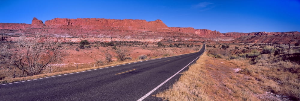 Road passing through Capitol Reef National Park Utah USA Canvas Art - Panoramic Images (36 x 12)