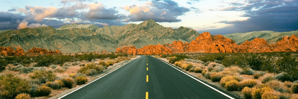 Road passing through a landscape Valley of Fire State Park Nevada USA Canvas Art - Panoramic Images (6 x 18)
