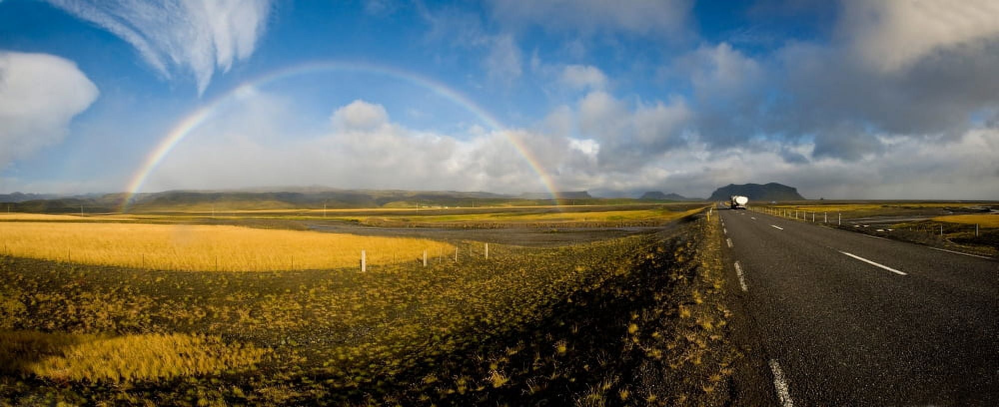 Road passing through landscape with full rainbow Route 1 Iceland Canvas Art - Panoramic Images (36 x 12)