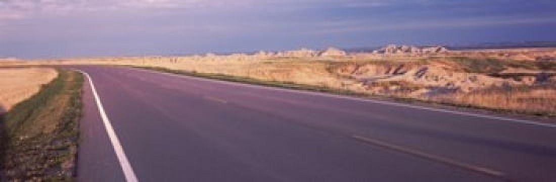 Road passing through the Badlands National Park South Dakota USA Canvas Art - Panoramic Images (18 x 6)
