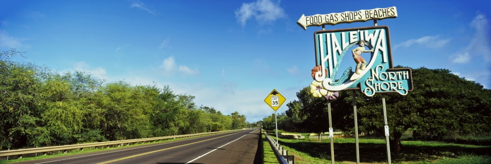 Road sign at the roadside Haleiwa Town North Shore Oahu Hawaii USA Canvas Art - Panoramic Images (36 x 12)